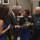 Annie Thibault and Dr. Frank Berger from the CCPN at USC present Governor Henry McMaster and Lt. Governor Pamela Evette with colorectal cancer awareness scarf and tie.